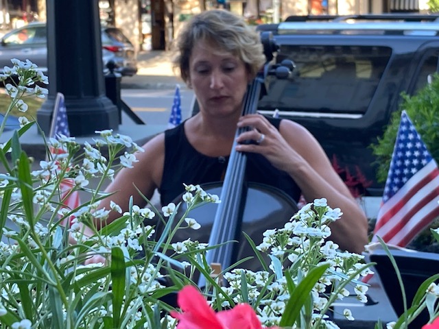 Performing for a summer festival outside a Saratoga Springs restaurant.